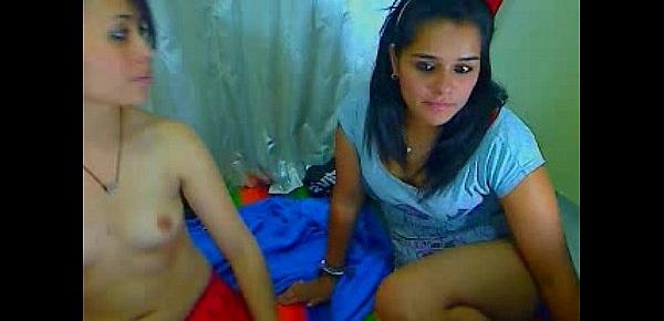  Sexy Latina lesbians fist some pussy on cam